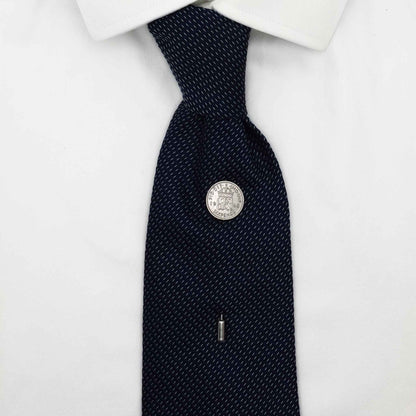Navy tie on white shirt with King George 6th coin tie pin