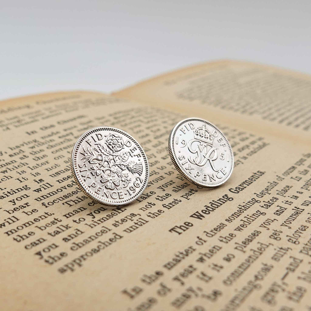 Two british sixpence coin lapel pins showing Queen Elizabeth 2nd and King George 6th minting designs