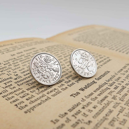 Two british sixpence coin lapel pins showing Queen Elizabeth 2nd and King George 6th minting designs