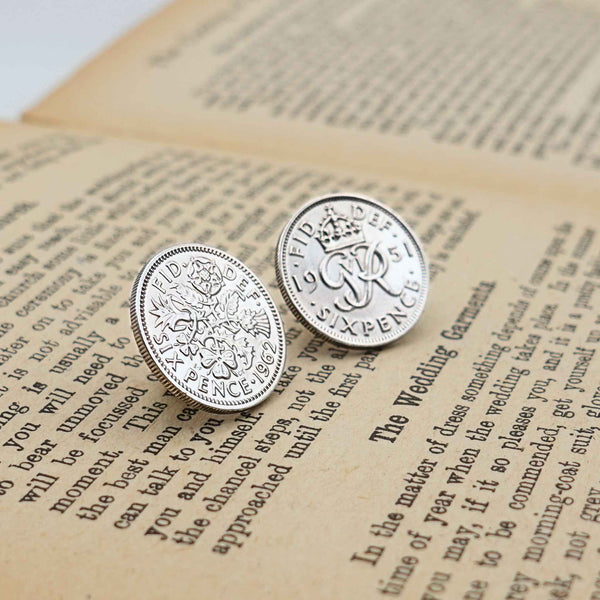 Two british sixpence coin lapel pins showing Queen Elizabeth 2nd and King George 6th minting designs