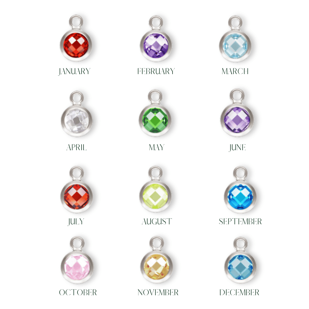 Birthstone pendants with colored gemstones for each month of the year on a white background