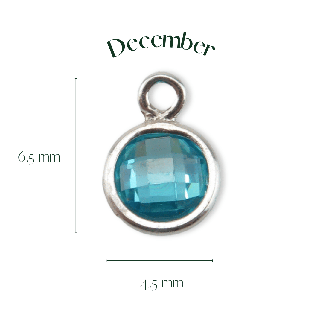 Blue gemstone pendant with silver frame and measurements on a white background
