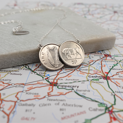 Silver necklace with pendant made of two Irish 5p coins on a map of Ireland