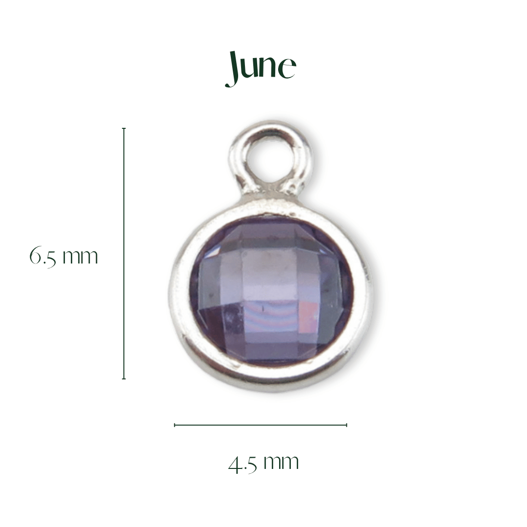 Silver pendant with purple gemstone and measurements on a white background, branded 'June'.