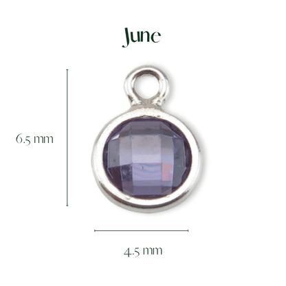 Silver pendant with purple gemstone and measurements on a white background, branded 'June'.