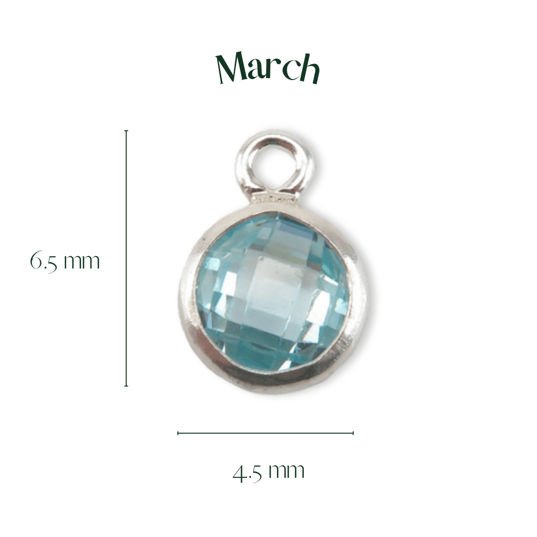 Silver pendant with a blue gemstone, labeled 'March', on a white background.