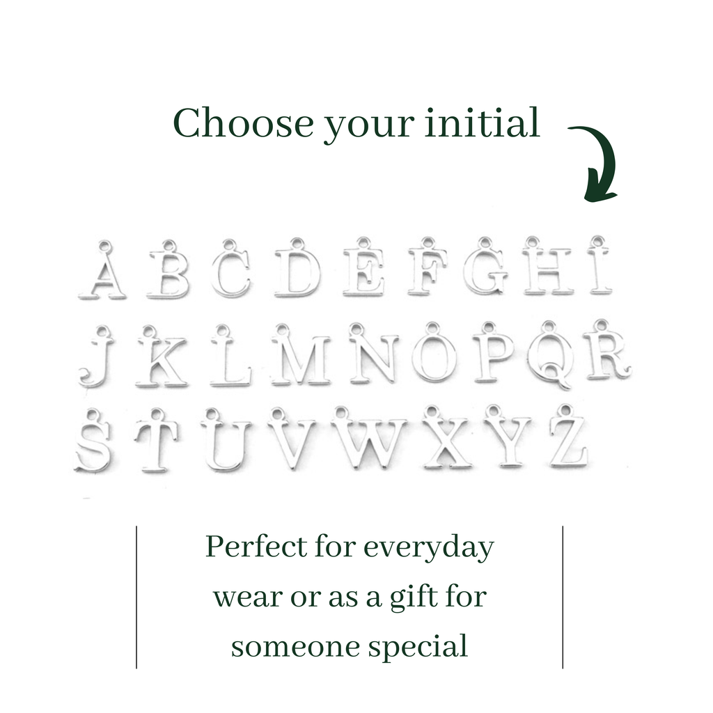 Sterling silver alphabetical letters initials displayed on a white background with text inviting users to choose an initial.