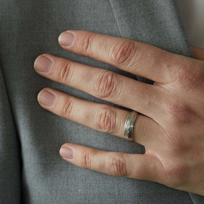 1800s Shilling coin ring on ring finger close up