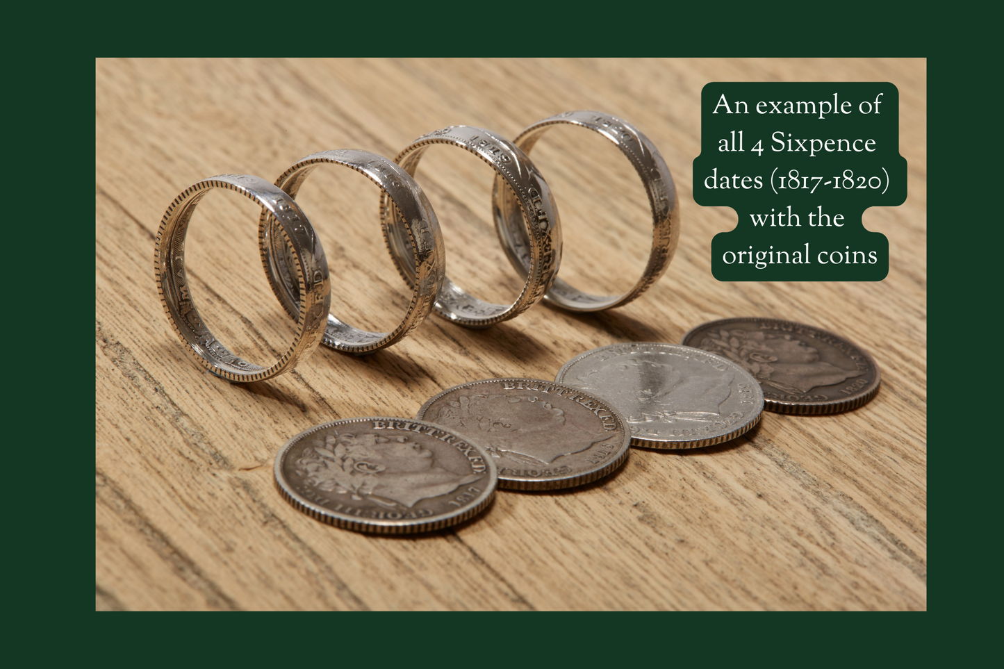 1817, 1818, 1819 and 1820 sixpence coin rings together on book with coins