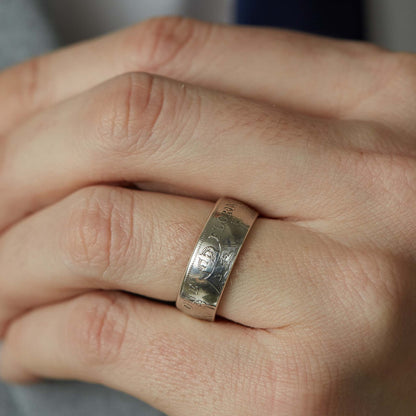 Florin coin ring close up on ring finger