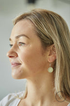 Handmade tiny delicate silver coin earrings on sterling silver ear wire | British threepence coins | Minimalist small drop silver earrings