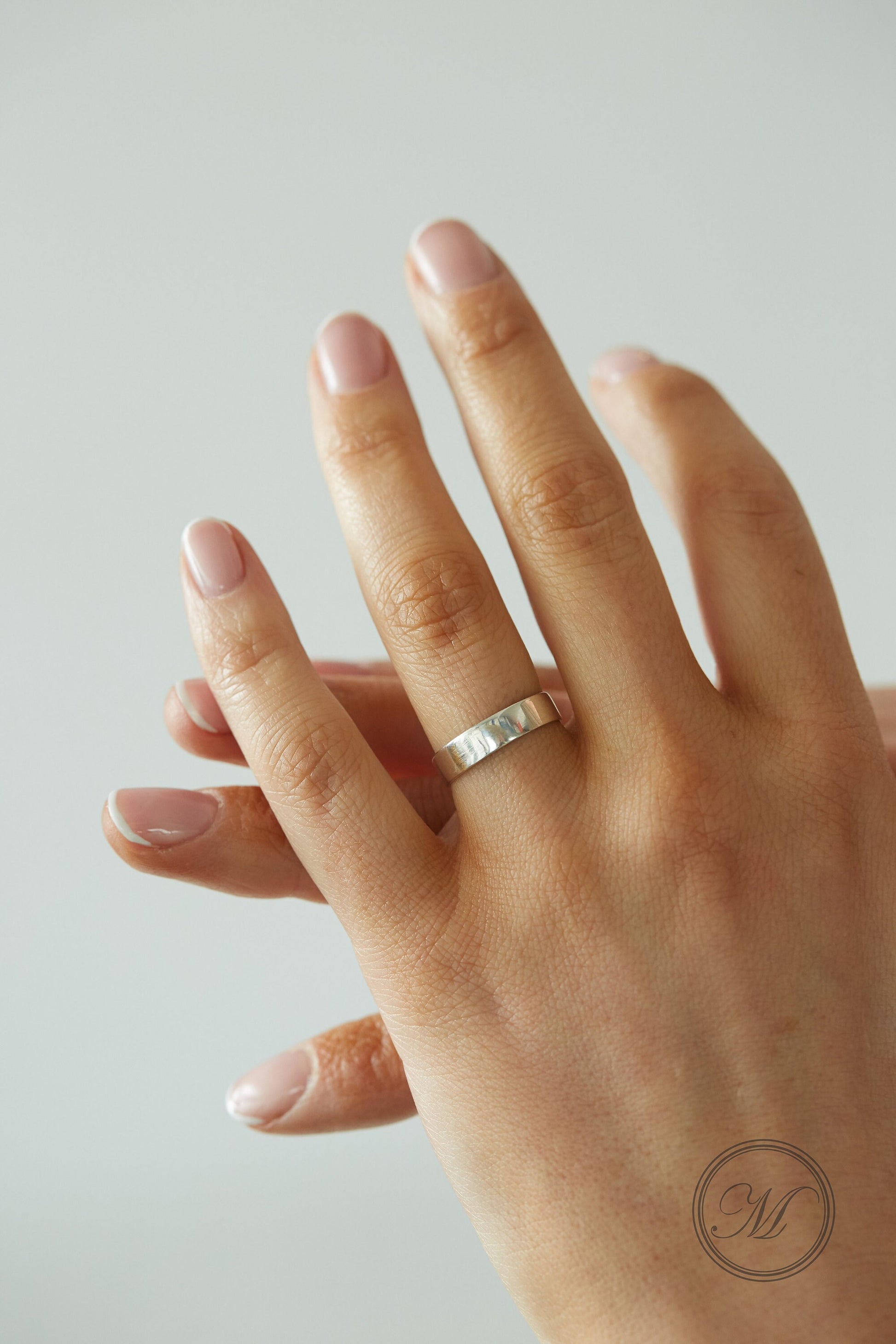 Sterling Silver Coin Ring Wedding Band - a delicate Sixpence coin ring, smooth on the outside and detailed inside. Size: Womans, small